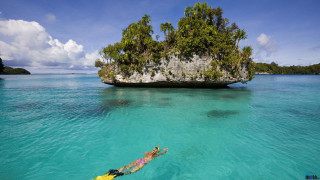 Swimming ocean island rock formation - sumatraism free wallpaper