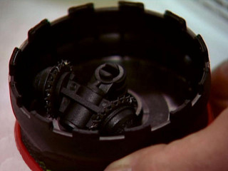 Person holding abstract sculpture twin - twin peak free wallpaper