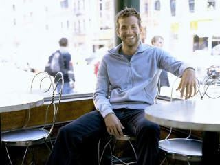 Man smiling table hands hips - adam willaerts free wallpaper