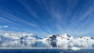 Snowy mountains icebergs blue sky - covered free wallpaper