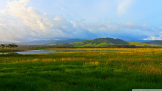 Field lake mountains clouds sky - landscape free wallpaper for desktop