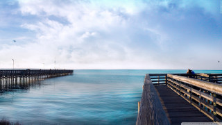 Pier person ocean pier bridge - tranquil free wallpaper