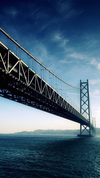 Large bridge over water boat - a blue sky above free wallpaper for mobile
