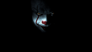 Creepy clown red nose yellow - a creepy clown free wallpaper