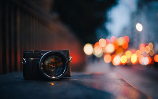 Camera ledge blurry lights moon - a ledge in front free wallpaper