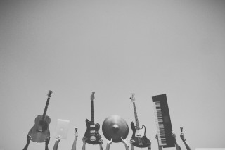 Guitars instruments row gray sky - musical free wallpaper