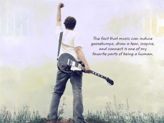 Man holding guitar quote music - music free wallpaper