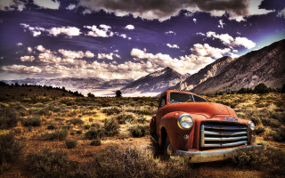 Old truck field mountains clouds - old free wallpaper