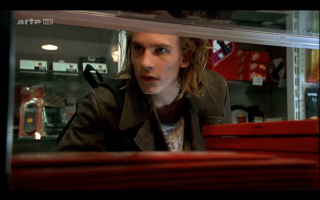 Man serious booth camera portrait - his face and shoulder free wallpaper