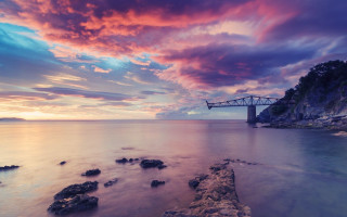 Bridge beach rocks sky cityscape - a sky in the background free wallpaper