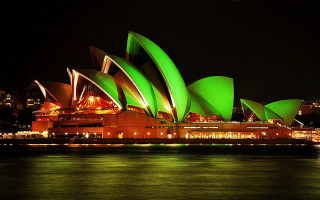 Large green building night lights - charles mcauley free wallpaper