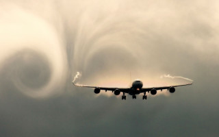 Plane flying sky cloud formation - free airplane wallpaper