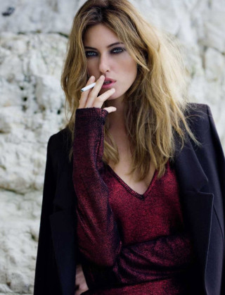 Woman smoking cigarette rock wall - fashion photography free wallpaper