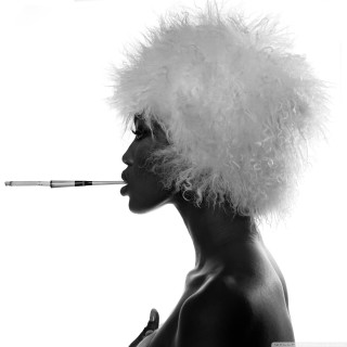 Woman feather hat smoking cigarette 2 - fashion photography free wallpaper for tablet
