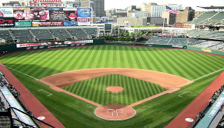 Baseball field people buildings skyline - a sky line free wallpaper