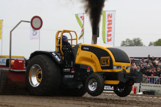 Tractor huge tire dirt track - a tractor free wallpaper