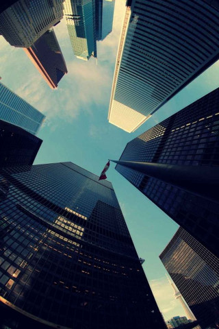 Tall buildings ground view sky - free city wallpaper for mobile
