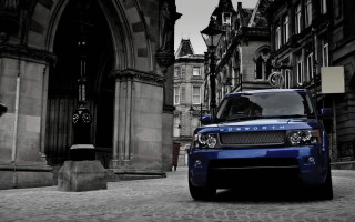Blue land rover cobblestone street - luxury free wallpaper