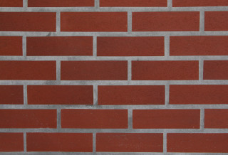 Red brick wall white clock 4 - a red brick wall free wallpaper