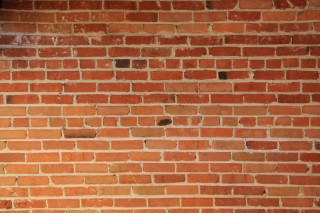 Red brick wall clock side - a red brick wall free wallpaper