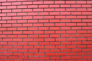 Red brick wall stop sign 2 - a red brick wall free wallpaper