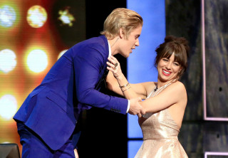 Man woman dancing stage showroom - the background and a woman free wallpaper