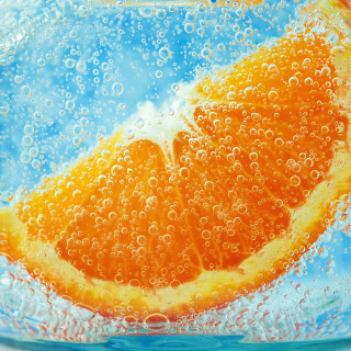 Orange slice water bubbles blue - a stock photo free wallpaper for tablet