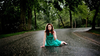 Woman sitting road rain green - an umbrella free wallpaper
