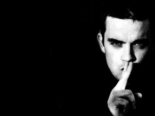 Man finger nose black background - deep shadow free wallpaper