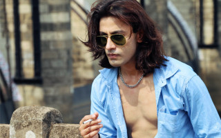 Man long hair sunglasses smoking - a cigarette in front free wallpaper