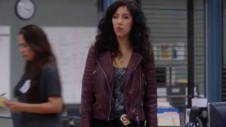 Woman purple jacket black pants - a man in the background free wallpaper