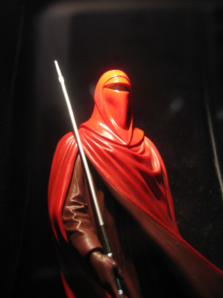 Statue man sword red cloak - a red cloak free wallpaper
