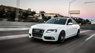 White car driving street sign - a white car free wallpaper