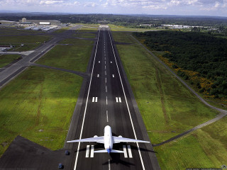 Jetliner airport runway lush green - lush free wallpaper