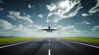 Jetliner flying runway blue sky 2 - cloud and sun free wallpaper for desktop