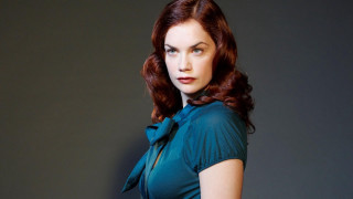 Redhair woman greenshirt darkbackground graywall - art deco free wallpaper