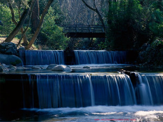 Waterfall bridge river rocks water - a bridge over free wallpaper