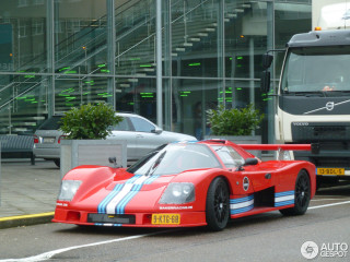 Red race car bus street - epic proportion free wallpaper