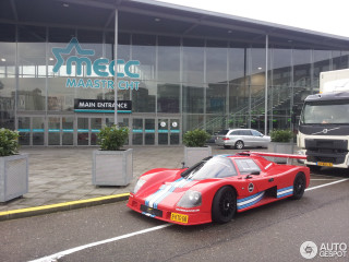 Red race car building bus - imax free wallpaper