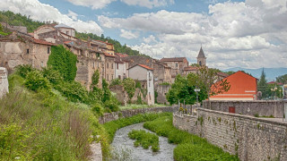 River lush hillside town tall - a lush green hillside next free wallpaper