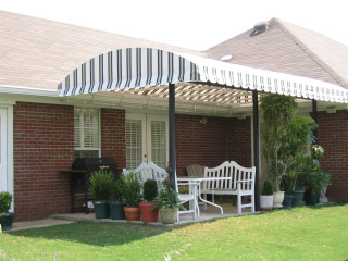 White bench under awning brick - front view free wallpaper