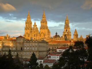 City clocktower sky clouds buildings - a few building free wallpaper