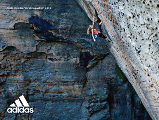 Man climbing rock face helmet 2 - anson maddock free wallpaper