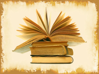 Pile of books on table - top of a table next free wallpaper