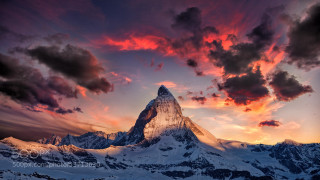 Mountain peak red sky clouds - a red sky in the background free wallpaper