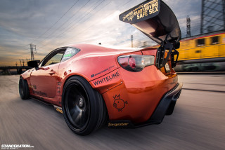 Red sports car train yellow - a train track free wallpaper