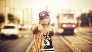 Woman long hair pointing tram - a street free wallpaper for desktop