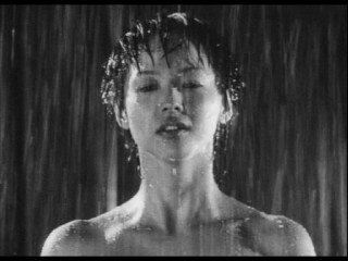 Woman standing rain eyes closed - the rain free wallpaper