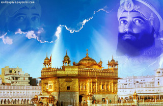 Golden building blue sky man - divine free wallpaper