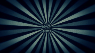 Nike logo dark background sunburst - a nike logo free wallpaper